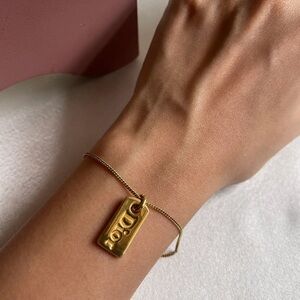 Dior Gold Bracelet with Logo Pendant